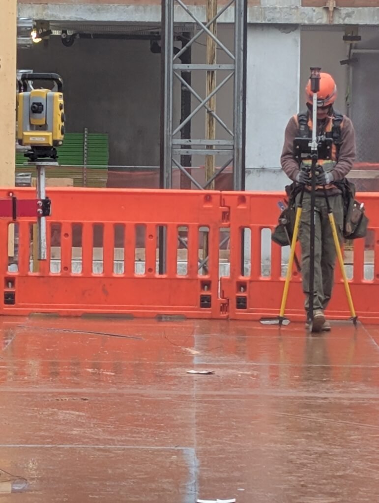 Electrician laying out with Trimble